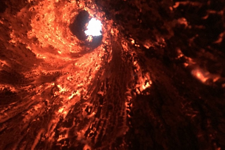 An old tree on a farm west of Jacksonville was struck by lightning and burned from the inside.  Photo:  Gary Hadden 
