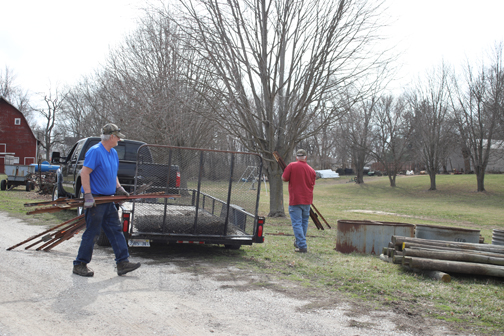 Members of Prairie Land Heritage Museum work to organize and categorize items for the March 9 auction.