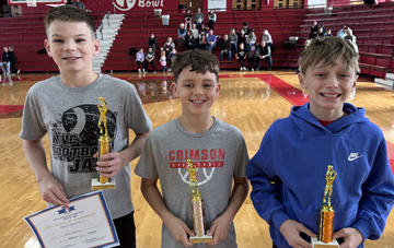 Ages 10-11 Boys division winners, from left: Jacob Williams – Winchester (1st place), Ryne Bunner – Eisenhower (2nd place) and Ace Zimmer – North (3rd place).