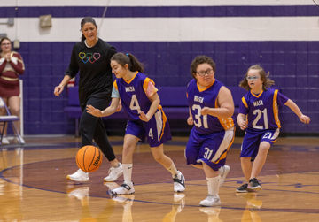 Winchester Area Special Athletes play a quarter of basketball at the Routt Dome